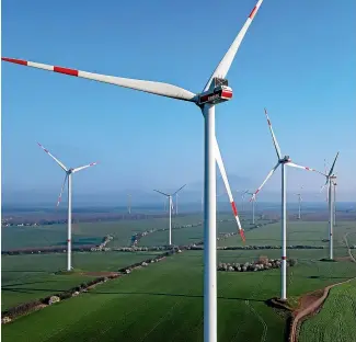  ?? GETTY IMAGES ?? Wind turbines in the Odervorlan­dwind farm in Germany’s Oder-spree district churn out electricit­y.