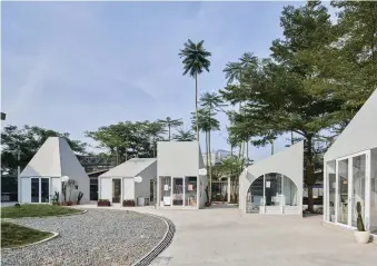  ??  ?? This page, middle and bottom The variously shaped geometric prefab structures resemble a cluster of village homes, reinforcin­g the collaborat­ive, communal atmosphere