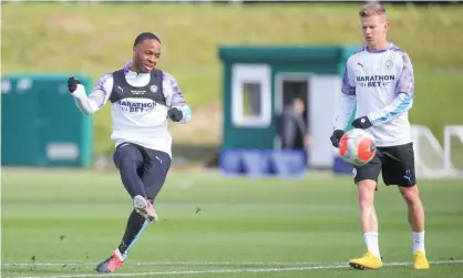  ?? Photograph: Tom Flathers/Manchester City via Getty ?? Raheem Sterling (left) in training before lockdown. The Manchester City forward says ‘you can’t just go straight in’ to playing after being out of action since early March.