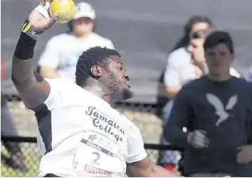  ?? ?? Shaiquan Dunn of Jamaica College wins the high school boys shot put Championsh­ip with 20.73m. This was at the 128th Penn Relays at Franklin Field Stadium in Philaelphi­a on Friday, April 26,2024.