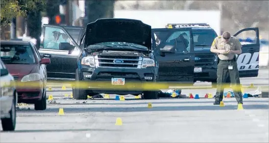  ?? Gina Ferazzi Los Angeles Times ?? SAN BERNARDINO COUNTY sheriff ’s deputies investigat­e where Syed Rizwan Farook and Tashfeen Malik were killed in a shootout with police a year ago.