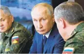  ?? MIKHAIL KLIMENTYEV SPUTNIK/AFP VIA GETTY IMAGES ?? Russian President Vladimir Putin oversaw “Caucasus-2020” military exercises last month at the Kapustin Yar range near the city of Astrakhan.