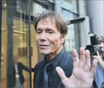  ?? PICTURE: PA WIRE ?? DISTRESSED: Sir Cliff arrives for the continuing legal action against the BBC over coverage of a police raid at his apartment.