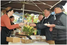  ??  ?? Michelle O’Sullivan serving tasty treats to customers at the Crinkle Store stand on the taste trail at the Dingle Food Festival on Saturday.