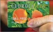  ?? AJC FILE ?? The owner of an Atlanta meat market loaned his EBT terminals to two other grocery stores in an effort to cheat the federal government’s food benefits program.