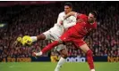  ?? Peter Byrne/PA ?? Darwin Núñez, right, and Raphaël Varane battle for the ball at Anfield. Photograph: