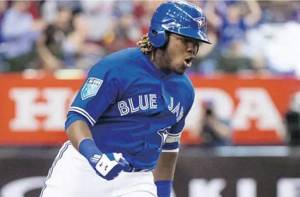  ?? PAUL CHIASSON / THE CANADIAN PRESS ?? Blue Jays fans are impatientl­y awaiting the arrival of Vladimir Guerrero Jr., who is putting up huge numbers at Double-A New Hampshire.