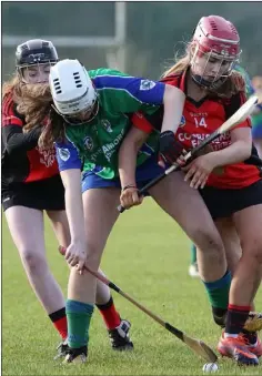  ??  ?? Alibeth Moran Curran of Glynn-Barntown is flanked by Oulart-The Ballagh duo Ciara Blake and Lauren Sinnott.