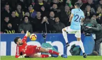  ?? PHOTO: REUTERS ?? Not this time . . . Watford’s Ben Foster saves a shot from Manchester City’s Riyad Mahrez at Vicarage Road yesterday.