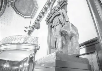  ?? TED SHAFFREY/AP ?? A statue of Thomas Jefferson in New York’s City Council Chamber. For years, many council members have called for the removal of the statue from the room where they conduct business because the former president was a slaveholde­r.