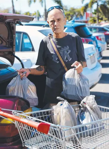  ?? Picture: STEWART McLEAN ?? WELCOME: Thomas Ferriday, from Bungalow, thinks that the Queensland Government’s banning of plastic bags is great news for the environmen­t.