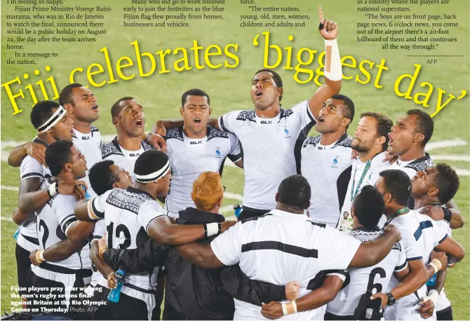  ?? Photo: AFP ?? Fijian players pray after winning the men’s rugby sevens final against Britain at the Rio Olympic Games on Thursday.