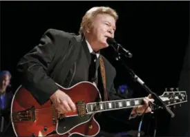  ?? MARK HUMPHREY — THE ASSOCIATED PRESS FILE ?? In this file photo, country music star Roy Clark performs after being inducted into the Country Music Hall of Fame in Nashville, Tenn. Clark, the guitar virtuoso and singer who headlined the cornpone TV show “Hee Haw” for nearly a quarter century, died Thursday due to complicati­ons from pneumonia at home in Tulsa, Okla., publicist Jeremy Westby said. He was 85.