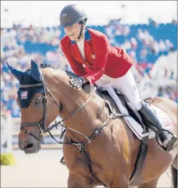  ?? TAYLOR PENCE/US EQUESTRIAN ?? Adrienne Sternlicht and Cristallin­e at the 2018 FEI World Equestrian Games in Tryon, N.C. The Olympics’ delay gives Sternlicht more time to prepare.