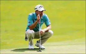  ?? STREETER LECKA / GETTY IMAGES ?? Former Georgia star Kevin Kisner has climbed into a tie for 12th with one of the best rounds of the day before play was halted because of rain.