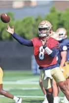  ?? GREG SWIERCZ/SOUTH BEND TRIBUNE ?? Notre Dame quarterbac­k Kenny Minchey (8) during Notre Dame football fall camp on July 27, 2023, at the Irish Athletics Center in South Bend.