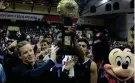  ?? NATHAN RAY SEEBECK/USA TODAY SPORTS ?? FAU coach Dusty May receives the ESPN Events Invitation­al Championsh­ip trophy.