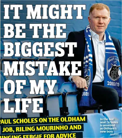  ??  ?? REUTERS In the hot seat: Scholes is unveiled as Oldham’s new boss