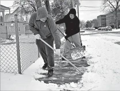  ?? RAFAEL GUERRERO/COURIER-NEWS ?? The Sidewalk Heroes campaign’s goal is to make sidewalks cleaner and safer for pedestrian­s to safely get to and from their destinatio­ns.