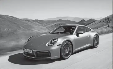  ?? PORSCHE VIA AP ?? The new Porsche 911 Carrera 4S. Porsche unveiled the eighth generation of his emblematic sports car in Los Angeles.