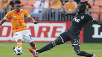  ?? YI-CHIN LEE/ THE ASSOCIATED PRESS ?? Vancouver Whitecaps forward
Kei Kamara, right, and his teammates have the second-lowest possession rate in the league, at 43.4 per cent.