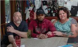  ?? Wisconsin. Photograph: Lianne Milton ?? Amy and Dan Wempner pose with their 18-year-old son Armond at their home in Kiel,