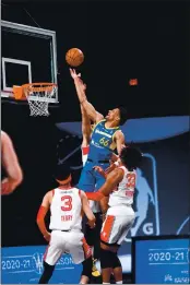  ?? JUAN OCAMPO — NBAE ?? Santa Cruz Warriors forward Axel Toupane, shown going up for a layup against Memphis on Thursday, had seven points and eight rebounds in the first half against Long Island on Saturday in the teams’ NBA G League game in Orlando.