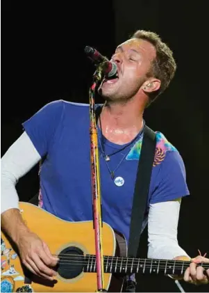  ?? FOTO: NTB SCANPIX ?? Vokalist Chris Martin i Coldplay under en konsert.