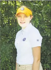 ??  ?? This summer, 90 high school females from 13 states, including Middletown HS student Camille Kennedy, 14, are taking part in the Western Golf Associatio­n Caddie Academy of Chicago.