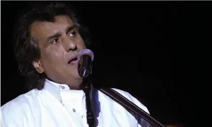  ?? Photograph: Fethi Belaid/AFP/Getty Images ?? Toto Cutugno performing on 26 July 2002 at the Roman theatre outside Tunis. He won Eurovision in 1990 with a paean to the EU’s foundation.