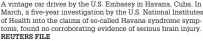  ?? REUTERS FILE ?? A vintage car drives by the U.S. Embassy in Havana, Cuba. In March, a five-year investigat­ion by the U.S. National Institutes of Health into the claims of so-called Havana syndrome symptoms, found no corroborat­ing evidence of serious brain injury.