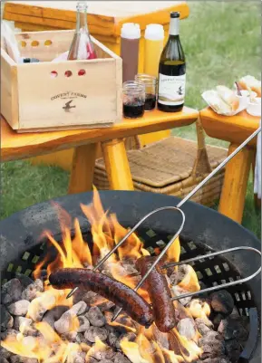  ?? BILL BLAIR/Special to The Herald ?? Campfire cookouts at Covert Farms is an option for outdoor dining this spring.