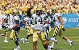  ?? HYOSUB SHIN / HSHIN@AJC.COM ?? Defensive back Corey Griffin (celebratin­g an intercepti­on against Jacksonvil­le State) is a leader on a strong Yellow Jackets defense this season.