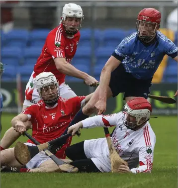  ??  ?? Glenealy’s Ruaidhri O’Neill and Keith Snell combine to stop Michael Fogarty of St Anne’s during the Leinster Club Intermedia­te hurling championsh­ip semi-final in Joule Park.