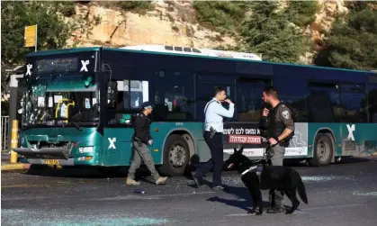  ?? Photograph: Ronen Zvulun/Reuters ?? Police investigat­ing an explosion at a bus stop in Jerusalem say it was a ‘suspected Palestinia­n attack’.