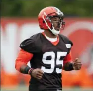  ?? RON SCHWANE — THE ASSOCIATED PRESS ?? Cleveland Browns’ Myles Garrett was giagnosed Saturday with a sprained left foot, but the top overall draft pick is expected to be ready for training camp next month.