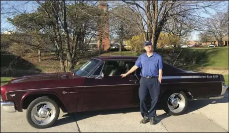  ?? Staff photo/Corey Maxwell ?? Chad Klosterman stands with his 1966 Chevrolet Impala — a car he’s had since he was 17 years old. He recently restored it after it caught fire in October 2019.