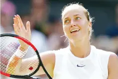  ?? — AFP photo ?? Czech Republic’s Petra Kvitova reacts after winning against Sweden’s Johanna Larsson during their women’s singles first round match on the first day of the 2017 Wimbledon Championsh­ips at The All England Lawn Tennis Club in Wimbledon, southwest London,...