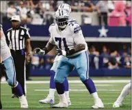  ?? Michael Ainsworth / Associated Press ?? Cowboys offensive tackle Jason Peters prepares to block against the Washington Commanders in Arlington, Texas, on Oct. 2.