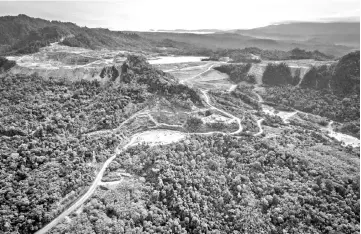  ??  ?? This handout picture shows an aerial view of a gold mine owned by PT. Agincourt Resources Martabe in the Batang Toru rainforest, the only known habitat of the Tapanuli orangutan, on Sumatra island. — AFP photo