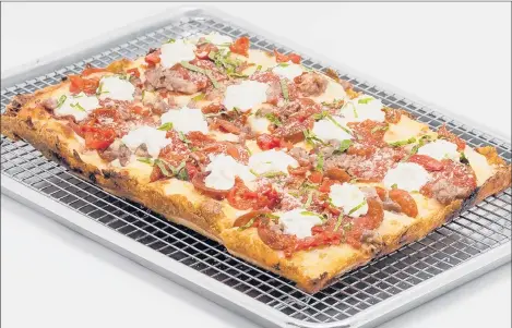  ?? /COURTESY OF JOEY GARLIC'S ?? Joey Garlic’s Detroit-style pizza is a new addition to the menu.