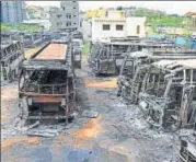 ?? HT FILE/KASHIF MASOOD ?? Remains of buses burnt by protesters over the Cauvery water issue. Riots broke out in both the states after the court turned down Karnataka’s plea to temporaril­y stop the release of water to Tamil Nadu.