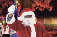  ?? Erik Trautmann / Hearst Connecticu­t Media file photo ?? Santa, played by Thomas Patterson, arrives for the 25th annual Community Christmas Tree Lighting and Christmas Caroling in Jackie Robinson Park in Stamford on Nov. 23.