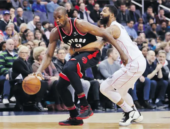  ?? THE ASSOCIATED PRESS ?? Toronto Raptors forward Serge Ibaka, left, believes his team has the ability to make it to the NBA final, but faces added pressure now from the U.S. media.