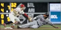  ?? MATT SLOCUM — THE ASSOCIATED PRESS ?? The Orioles’ Manny Machado, right, slides into second base past the Phillies Scott Kingery after Machado hit a double during the fourth inning Tuesday at Citizens Bank Park.