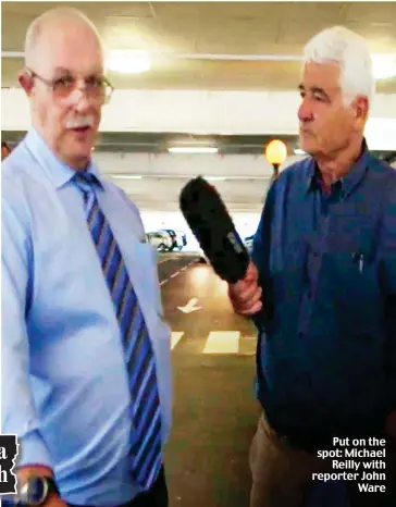  ??  ?? Put on the spot: Michael Reilly with reporter John Ware