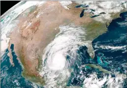  ?? NOAA VIA AP ?? This Oct. 8 photo made available by the National Oceanic and Atmospheri­c Administra­tion shows Hurricane Delta in the Gulf of Mexico at 12:41 p.m. EDT.