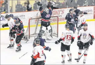  ?? TELEGRAM FILE PHOTO/GLEN WHIFFEN ?? In this file photo, Harbour Grace Ocean Enterprise­s Ceebee Stars goalie A.J. Whiffen raises his arms in celebratio­n amid dejected members of the Clarenvill­e Caribous at the conclusion of Game 5 of the 2017 Herder Trophy provincial senior hockey...