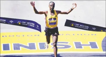  ?? CHARLES KRUPA/AP ?? SISAY LEMMA, of Ethiopia, breaks the tape to win the Boston Marathon on in Boston.