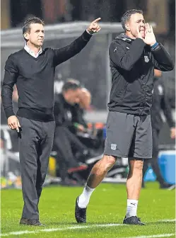  ?? Picture: SNS. ?? Making a point: Dundee boss Neil McCann and assistant Graham Gartland have made a big impression, especially on the touchline during games.